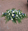 Funeral Flowers | Blue/Purple And Cream Coffin Spray