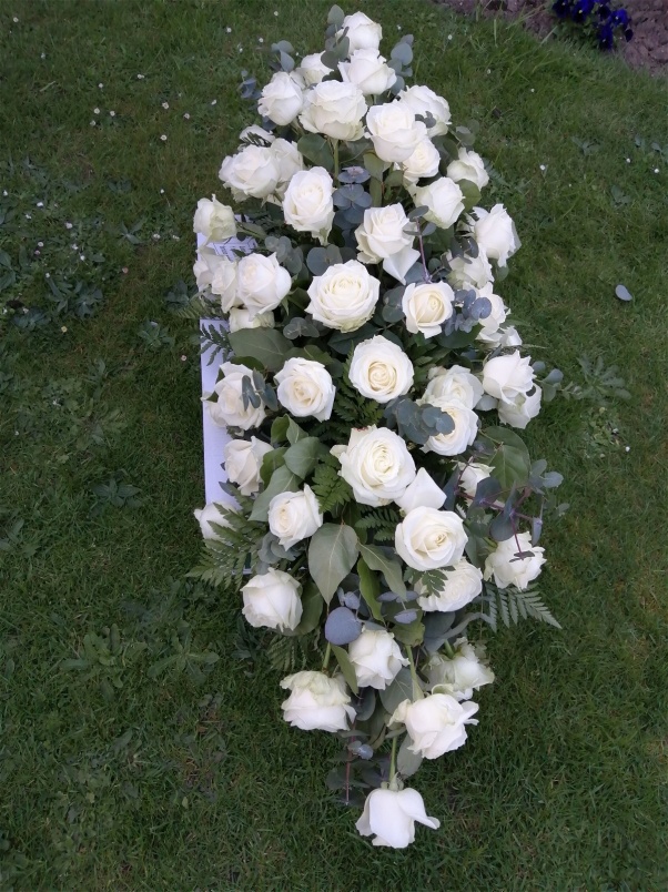 Funeral flowers  | rose coffin spray