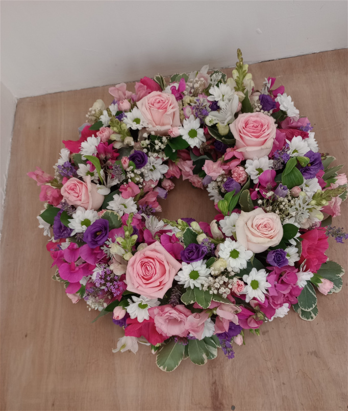 Funeral flowers  | traditional loose wreath