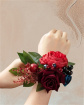 prom corsages & flowers | Burgundy and red wrist corsage