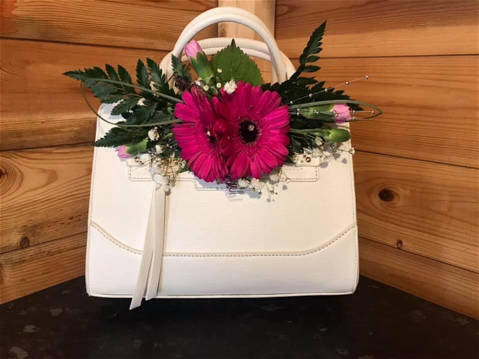 button holes and corsages | Hand bag corsage