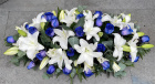 All Funeral Tributes | Casket sprays | Blue rose and Lily Casket spray