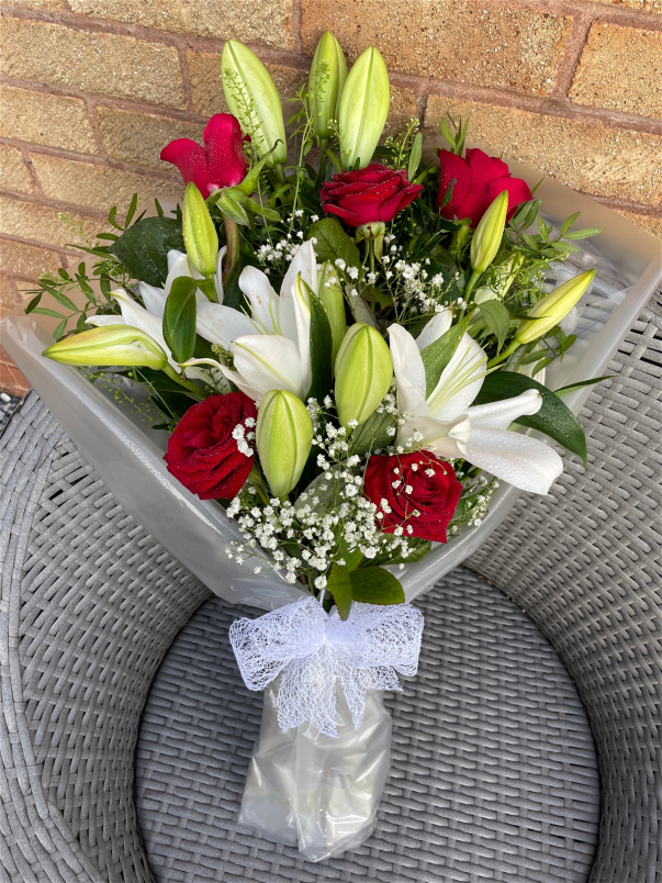 All Funeral Tributes | Gift Flowers  | Open lily and rose spray