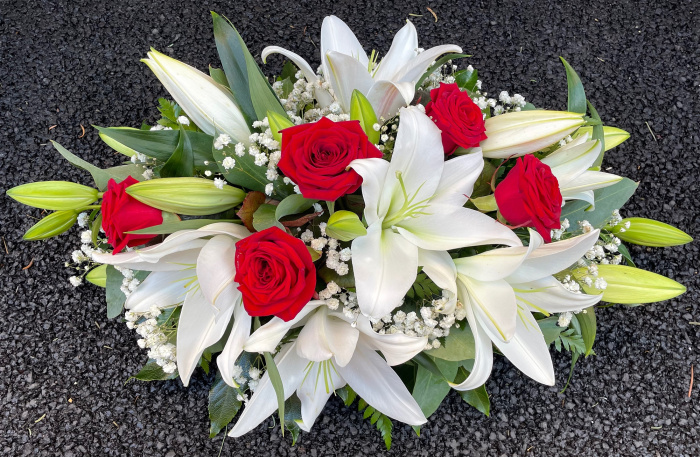 All Funeral Tributes | Posies / Wreaths | Oval lily posy spray