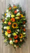 Funerals & Sympathy | Orange, yellow, green and white coffin spray