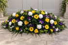 Funerals & Sympathy | Yellow, purple, green and white coffin spray