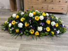 Funerals & Sympathy | Yellow, purple, green and white coffin spray