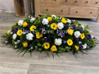 Funerals & Sympathy | Yellow, purple, green and white coffin spray