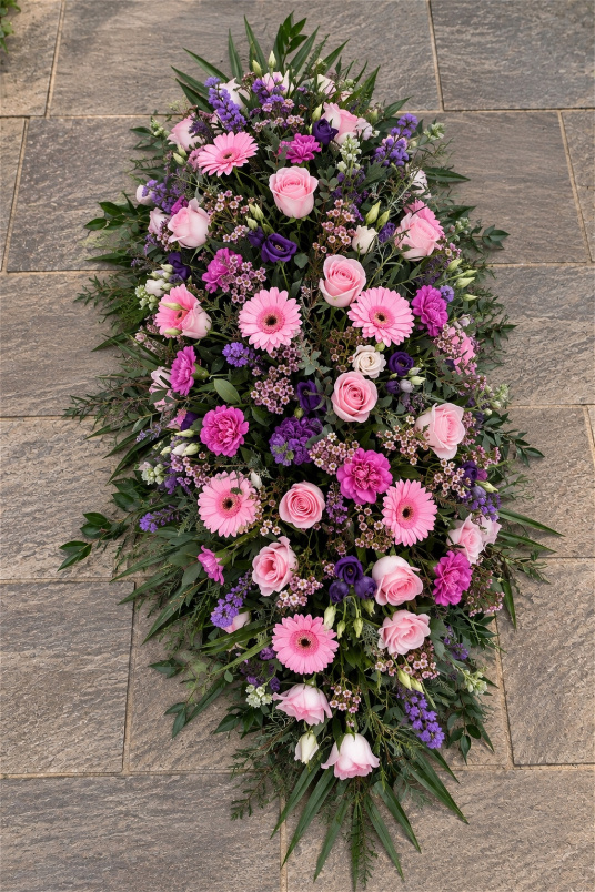 Funerals & Sympathy | Pink and purple spray with trailing foliage