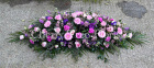 Funerals & Sympathy | Pink and purple spray with trailing foliage