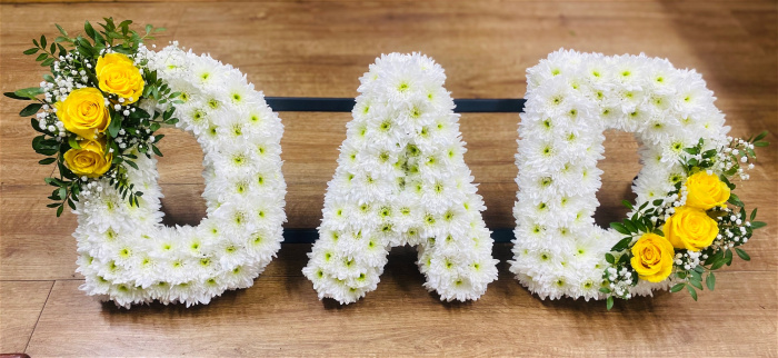 Funeral | DAD - yellow and white funeral lettering