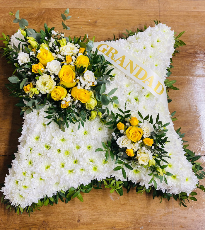 Funeral | Yellow and white pillow