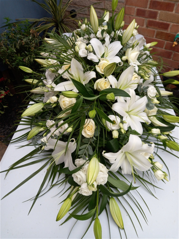 Casket Sprays | Funeral & Sympathy | Stunning casket spray of oriental lilies and roses (Available in various colours)