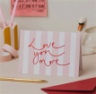 Valentine’s Day Accessories | Love You More Pink Stripe Card