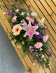 Casket sprays | Funeral Tributes | Pink, purple & peach coffin spray