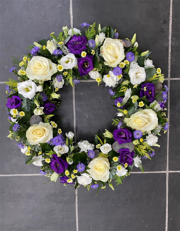 Funeral Tributes | Wreaths & Posies | Purple & cream wreath