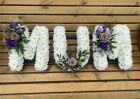 Funeral Tributes | Letter Tributes | White, lilac & purple Mum tribute