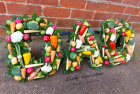 Traditional funeral tributes | Vegetable letter tributes