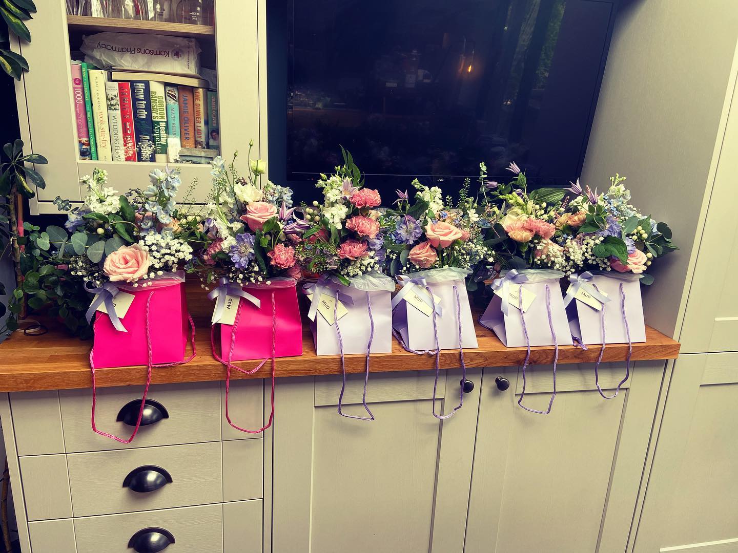 Casket flowers made up into small arrangments for family and friends to take home after the funeral.