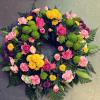 Bright funeral wreath from £70