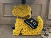 A Yellow foam dog tribute made from yellow Chrysanthemums £180
