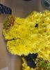 A yellow labrador tribute, showing a head shot close up made with yellow chrysanthemum flowers £180