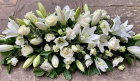 Funeral Flowers | Lily and Rose Casket spray