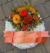 Funeral Tributes | Orange & White Based Posy Pad