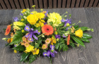 Funeral Flowers | Funeral Sprays | Bright teardrop spray.