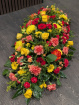 Funeral Flowers | Funeral Sprays | Red, orange and yellow coffin spray