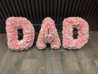 Funeral Flowers | Letter Tributes | Dad blue carnation letter tribute
