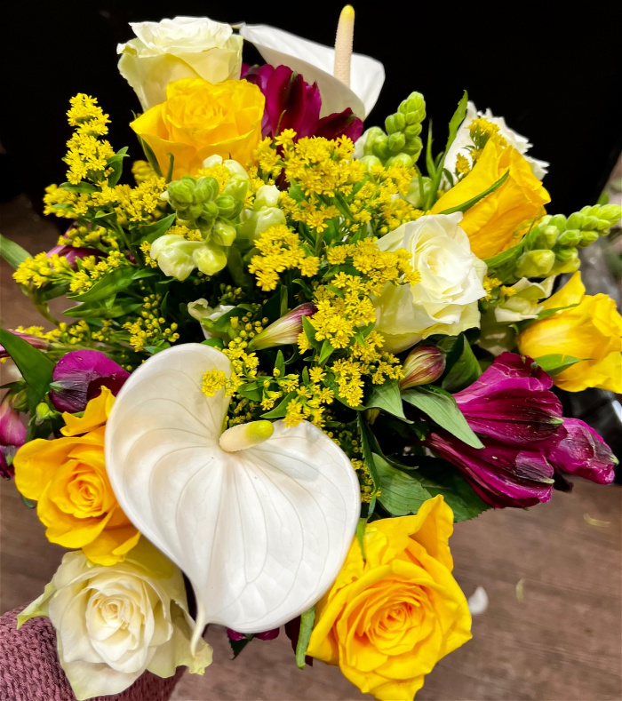 Arrangements | Bouquets | Gifts | Enchanted Forest_: A lush, whimsical arrangement featuring Anthurium, Roses and wildflowers