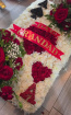 Bespoke Funeral Tributes | Winning Hand Arrangement