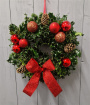 Christmas | Decorated holly wreath.