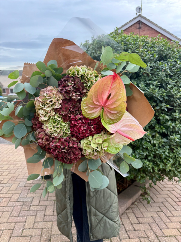 Festive Bouquets | Lilly pad in winter bouquet