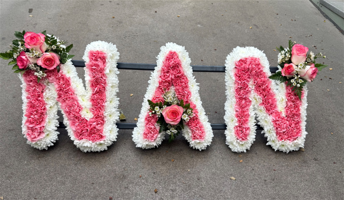Letters | View All Funeral Flowers | NAN tribute with carnations