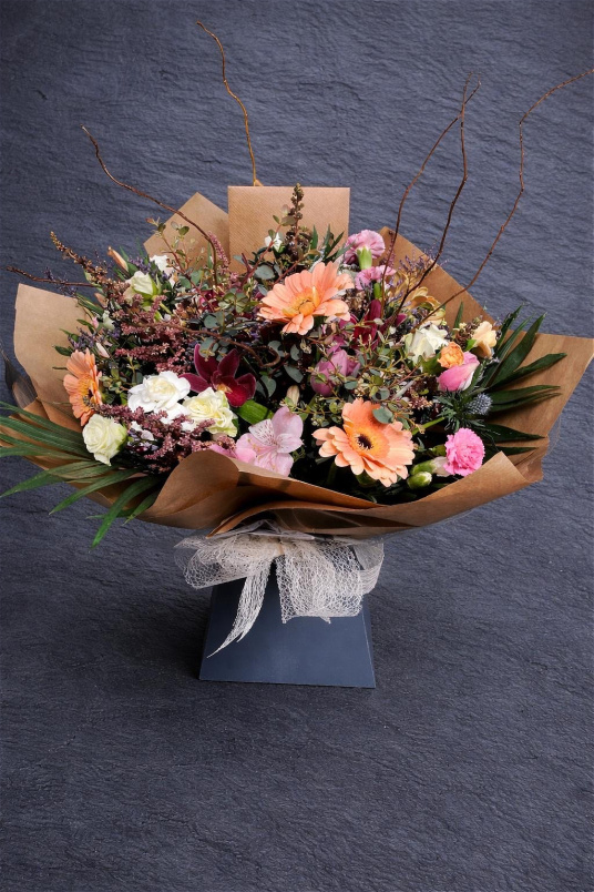 Arrangements | Hand tied bouquet in water