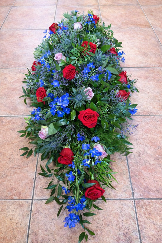 Sympathy Sprays | Double Ended Spray ~ With Red Roses, Thistles & Deep Blue  Delphiniums