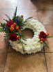Wreaths  | Classic Massed Wreath ~ With orange And Red Spray With A Touch Of Blue