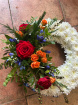 Wreaths  | Classic Massed Wreath ~ With orange And Red Spray With A Touch Of Blue