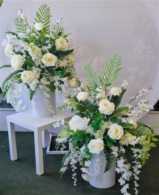 Hire Range | Floral Milk Churns