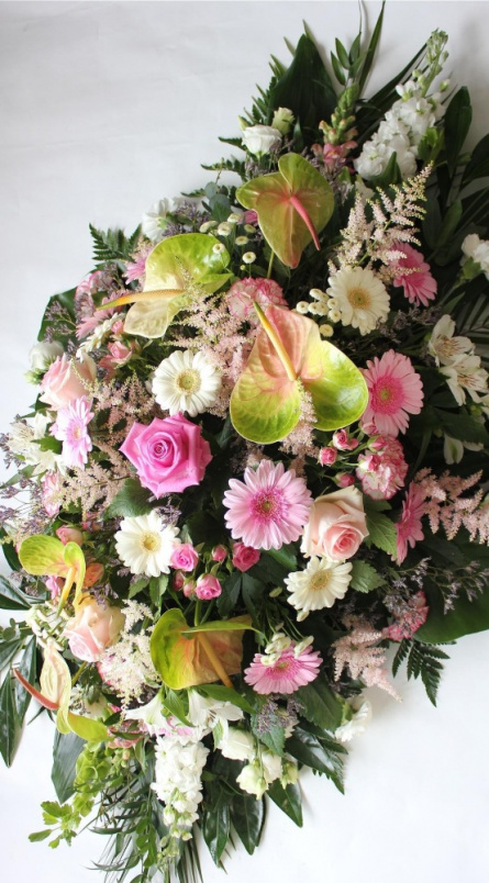 Funeral tributes | Pink coffin spray