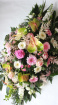 Funeral tributes | Pink coffin spray