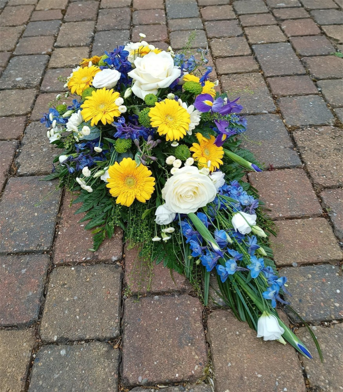 Funeral tributes | A Teardrop Spray in yellow and blue