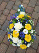 Funeral tributes | A Teardrop Spray in yellow and blue