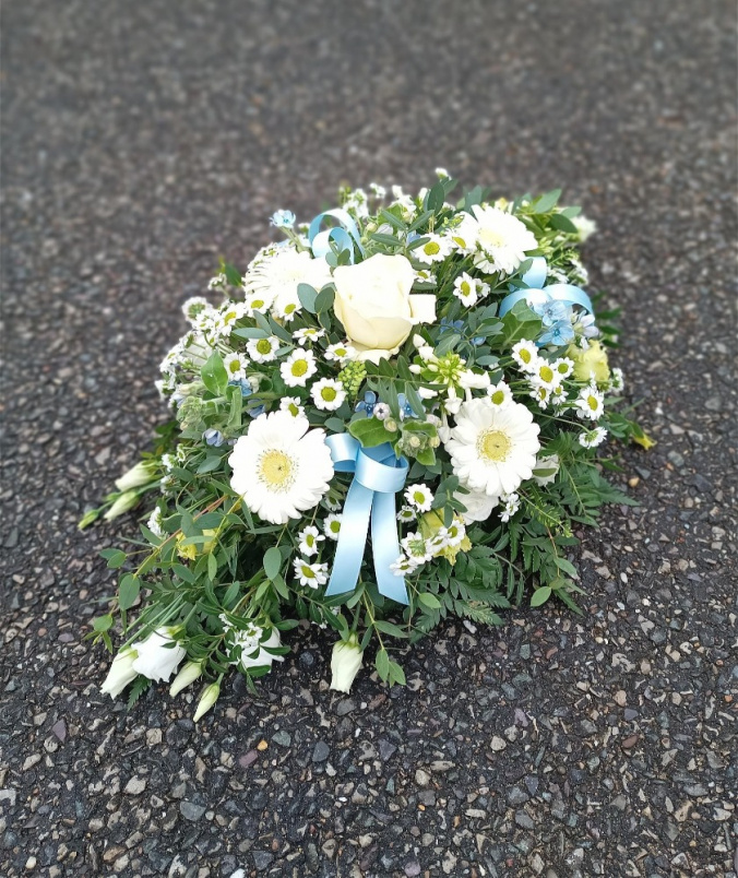 Funeral tributes | Delicate Casket Spray for a child