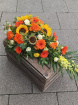 Funeral tributes | Coffin Spray: orange and yellow