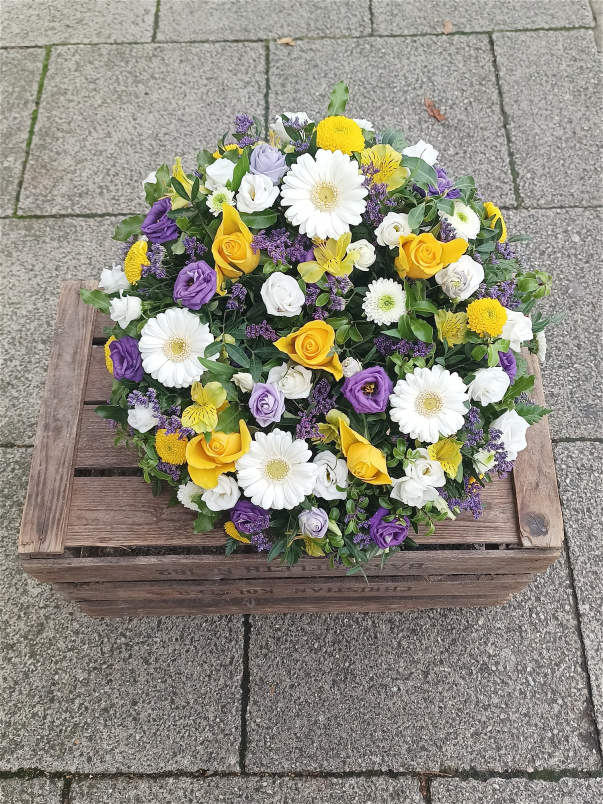 Funeral tributes | Posy pad: yellow, white, purple