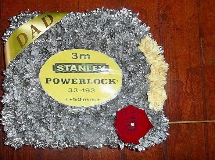 Funeral Flowers | Tape measure funeral tribute