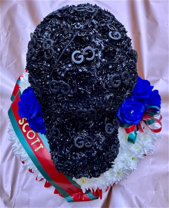 Funeral Flowers | Gucci cap funeral tribute